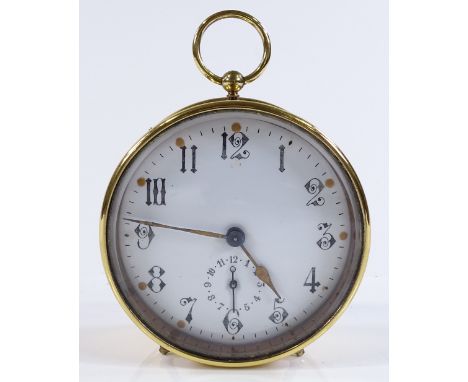 A Victorian brass drum-cased travelling alarm clock, with enamel dial, striking on a bell, diameter 9.5cm 