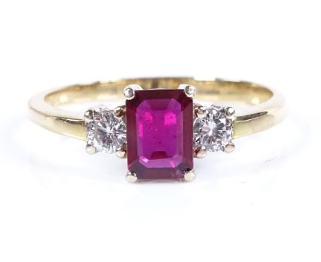 An unmarked gold 3-stone ruby and diamond ring, emerald-cut ruby approx 0.77ct, settings test as 18ct gold, setting height 7.