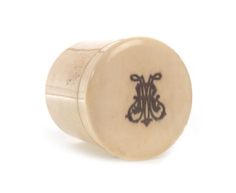 EARLY 20TH CENTURY CONTINENTAL IVORY TEA CADDY, of circular form, the hinged cover with inset white metal decoration, 10.5cm 