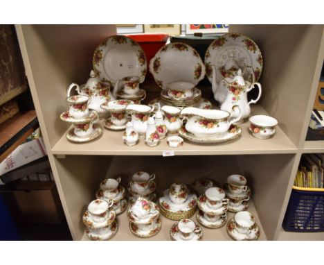 An extensive selection of Royal Albert Old Country Roses teawares, to include tea and coffee pot, cups, saucers, plates, cloc
