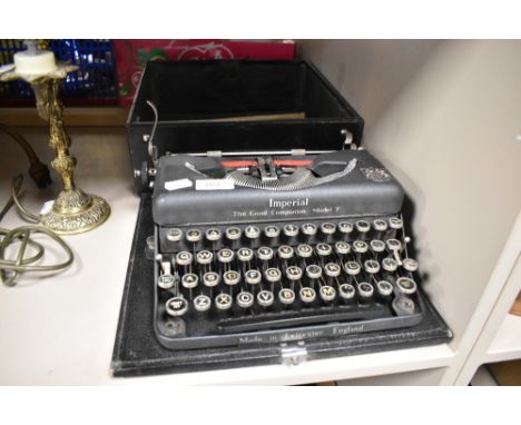A 1930s Imperial 'The good companion model T' typewriter.