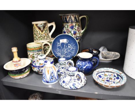 A Charlotte Rhead (Bursley Ware) tube-lined basket, sold together with a selection of Jerusalem Iznic design pottery, and Wet
