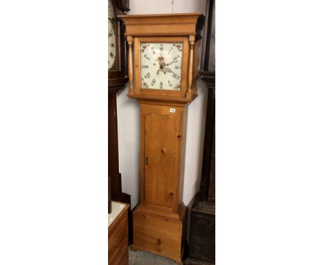 A pine cased 30 hours long case clock with square painted dial.