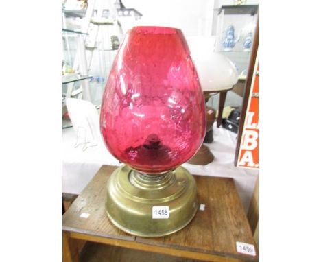 A brass oil lamp with cranberry shade, a/f.