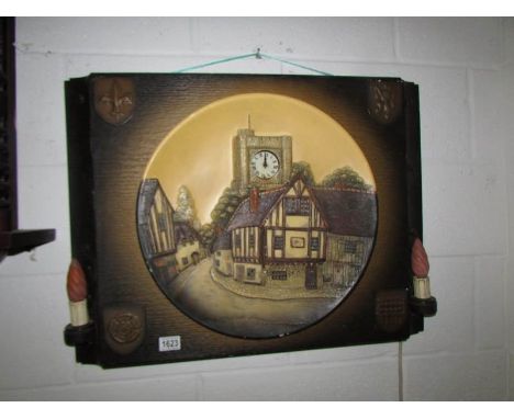 A large Bosun's? illuminating wall plaque incorporating electric clock.