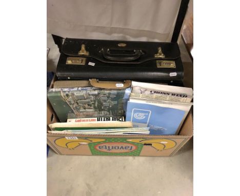A pilot's case and contents including compass etc together with maps, books etc on Hong Kong.