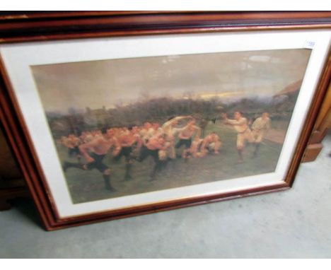 A large framed and glazed print of an early rugby scene.
