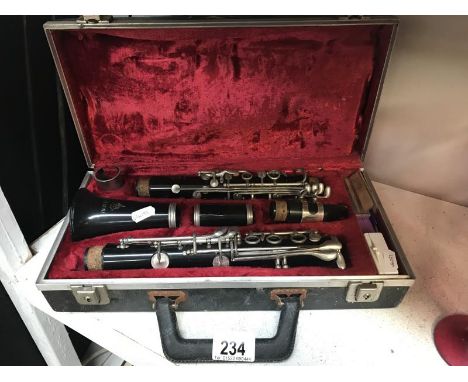 A cased Regent clarinet.