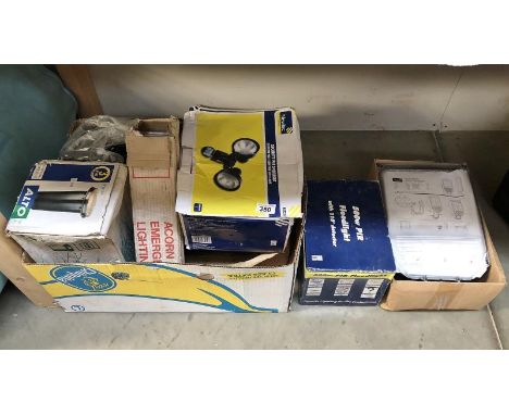 A quantity of lighting, some boxed, including flood lighting.