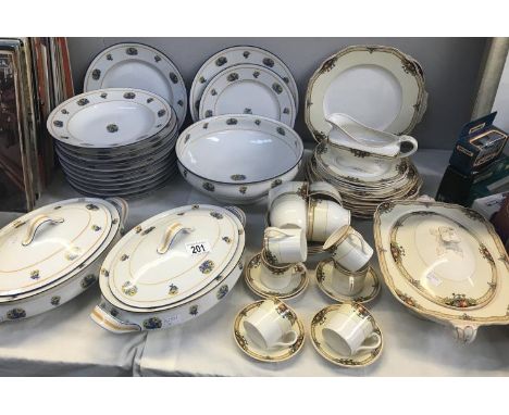 36 pieces of Windsor ivory tea and coffee ware and 17 pieces of Theodore Haviland limoges dinner ware.