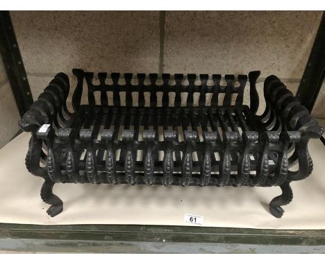 A cast iron fire gate.