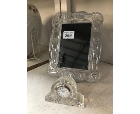 A Waterford glass picture frame and a Waterford glass miniature mantel clock (a/f).