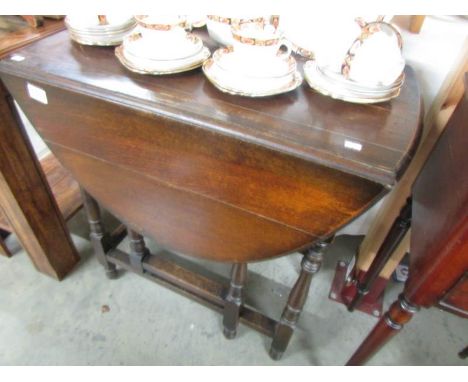 An oak gate leg table.