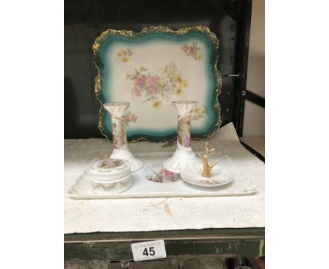 A part china trinket set and a porcelain tray.