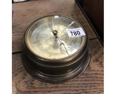 A brass ships style barometer. (Glass A/F)