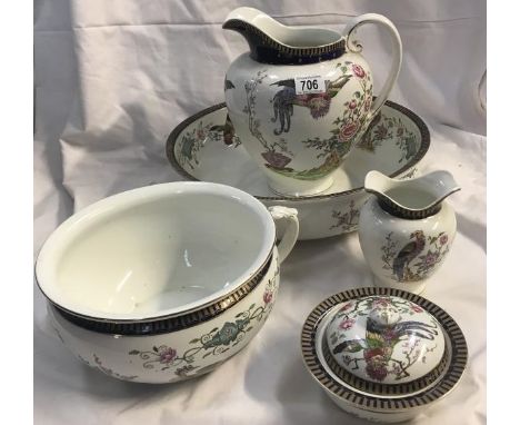 An imperial porcelain jug, basin, chamber pot, soap dish and toothbrush jar.