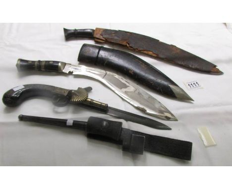 2 old Gurkha knives (one with a/f scabbard), a replica pistol knife and a WW1 bayonet.