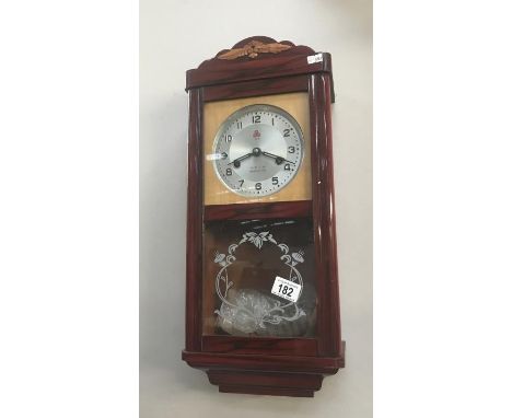 An antique style modern wall clock.