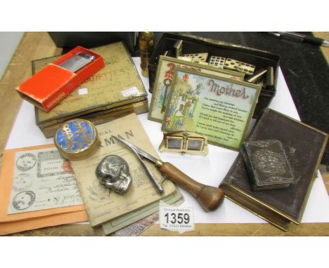 A mixed lot including dominoes, cigarette silks, silver fronted bible, WW2 ephemera, skull vesta case, boxed Ronson lighter e