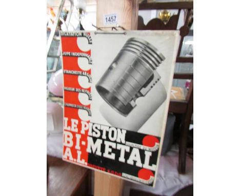 A vintage French piston advertising sign.