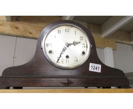 An old Westminster chime mantel clock.
