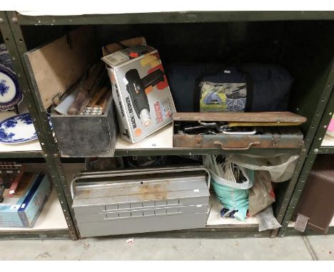 2 shelves of tools including socket set.