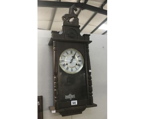 A wall clock with key (no pendulum).