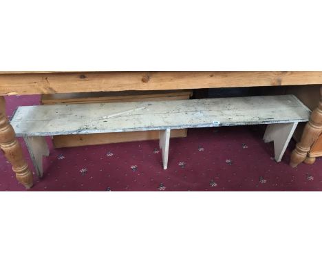 A vintage painted long bench stool.