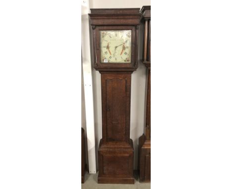 An oak cased 30 hour long case clock with square painted dial decorated with birds, 'Hargreaves, Settle'.