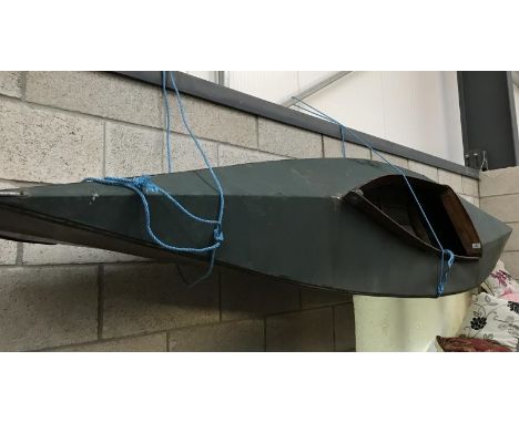 A vintage wooden canoe.