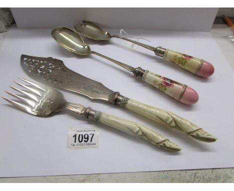 A pair of superb quality silver plated fish servers and a pair of salad servers with ceramic handles.