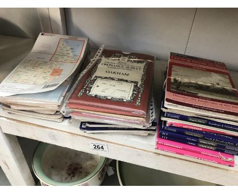 A quantity of Ordnance Survey maps.
