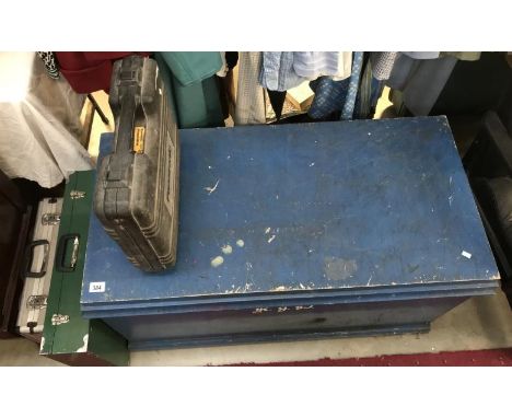 A large toolbox with tools and 3 additional boxes.