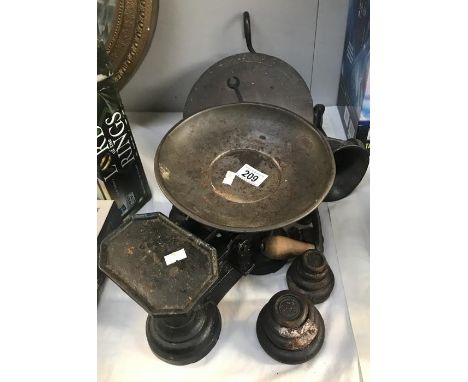 Cast iron kitchen scales, brass faced sack scales and a mincer.