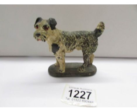 A 1930's cold painted bronze terrier stamped 'Chorus Brand, London'.