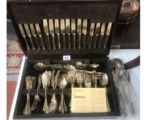 A canteen of Eurasco bronze cutlery and additional matching cutlery.
