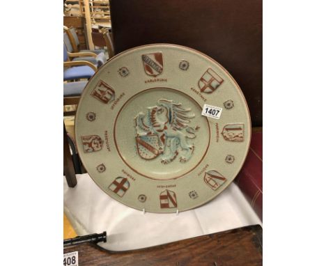 A large pottery presentation plate from the state of Baden-Wurtemberg, bearing state and city crests.
