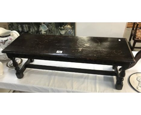 A dark oak long stool/bench, a long purple Dunhelm stool and 1 other.