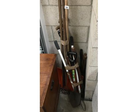 A quantity of garden tools including spade, shovel etc.