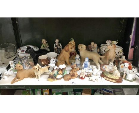 A quantity of assorted figures and china ware including dogs, Regency Fine Arts, nature craft, Hornsea, Sylvac, Melba etc.