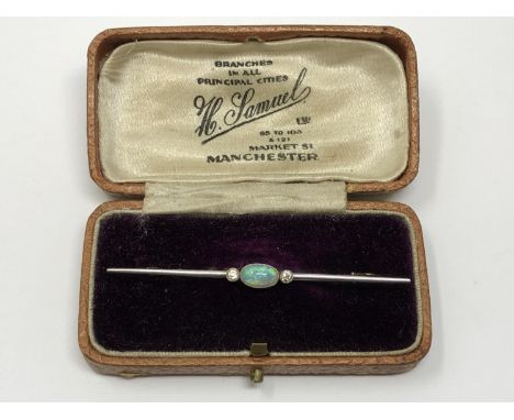 An 18ct gold and platinum opal and diamond brooch, 3.25g.