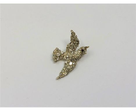 An antique ruby and diamond swallow brooch