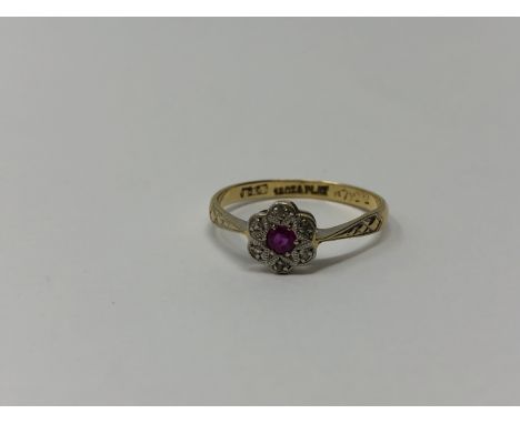 An antique 18ct gold ruby and diamond ring