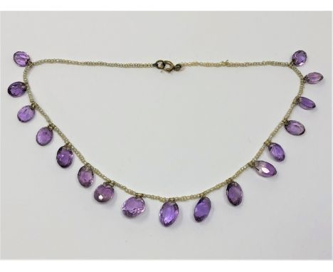 A fine antique amethyst and pearl necklace with gold fittings