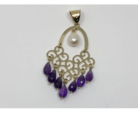 An unusual 14ct gold amethyst and pearl pendant