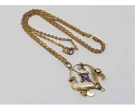 An antique gold amethyst pendant on chain, 4.3g.