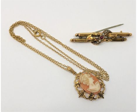 A 15ct gold ruby and pearl brooch, 3.3g, together with a yellow metal cameo pendant on chain. (2)