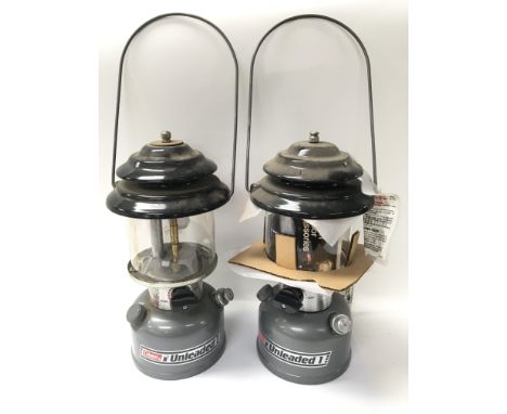 A boxed and an unboxed Coleman Model 282-700 unleaded lantern (2).