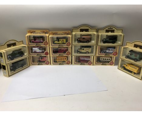 A box containing a group of Days Gone Lledo model cars, boxed