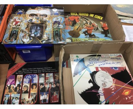 Two boxes of LPs and 12inch singles by various artists including Michael Jackson, Roxy Music and others.